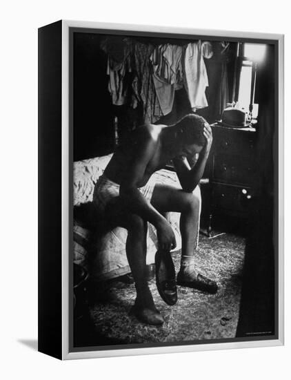 Pensive Portrait of Young African American Alone in His Room from Youth Essay-Gordon Parks-Framed Premier Image Canvas