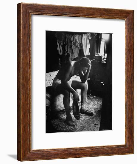 Pensive Portrait of Young African American Alone in His Room from Youth Essay-Gordon Parks-Framed Premium Photographic Print