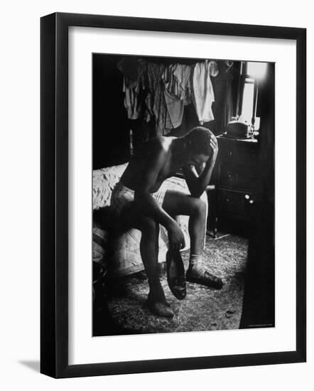 Pensive Portrait of Young African American Alone in His Room from Youth Essay-Gordon Parks-Framed Photographic Print