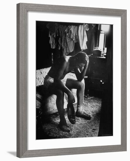 Pensive Portrait of Young African American Alone in His Room from Youth Essay-Gordon Parks-Framed Photographic Print