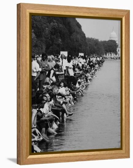 People at Civil Rights Rally Soaking their Feet in the Reflecting Pool at the Washington Monument-John Dominis-Framed Premier Image Canvas