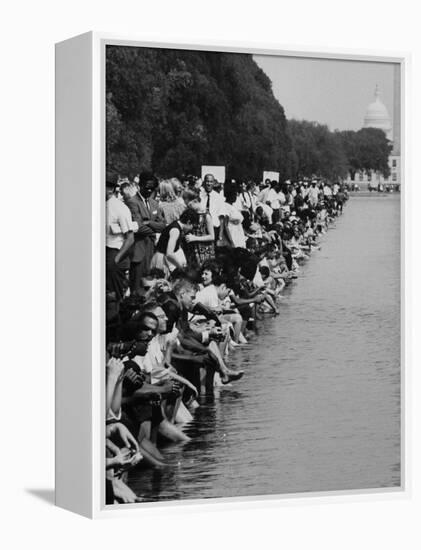 People at Civil Rights Rally Soaking their Feet in the Reflecting Pool at the Washington Monument-John Dominis-Framed Premier Image Canvas