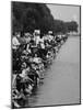 People at Civil Rights Rally Soaking their Feet in the Reflecting Pool at the Washington Monument-John Dominis-Mounted Photographic Print