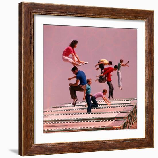 People Bouncing on Trampolines at Trampoline Center-J^ R^ Eyerman-Framed Photographic Print