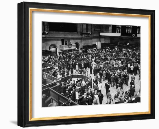 People Crowding the Stock Exchange Building-Charles E^ Steinheimer-Framed Photographic Print