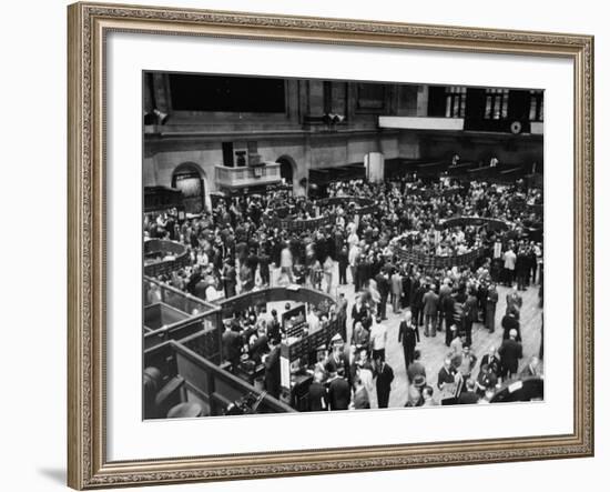 People Crowding the Stock Exchange Building-Charles E^ Steinheimer-Framed Photographic Print