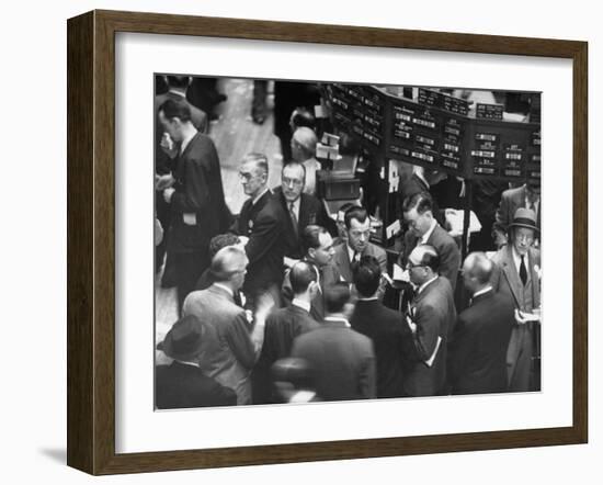 People Crowding the Stock Exchange Building-Charles E^ Steinheimer-Framed Photographic Print