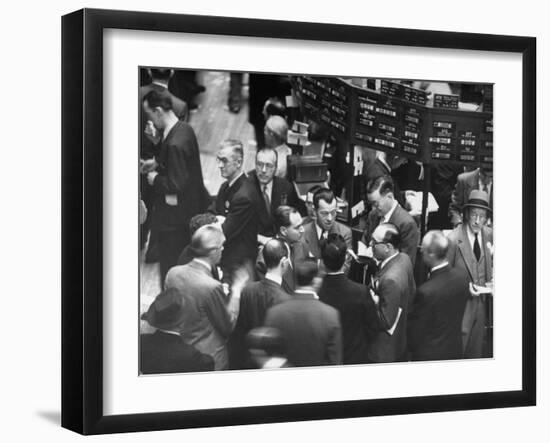 People Crowding the Stock Exchange Building-Charles E^ Steinheimer-Framed Photographic Print