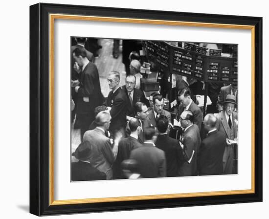 People Crowding the Stock Exchange Building-Charles E^ Steinheimer-Framed Photographic Print