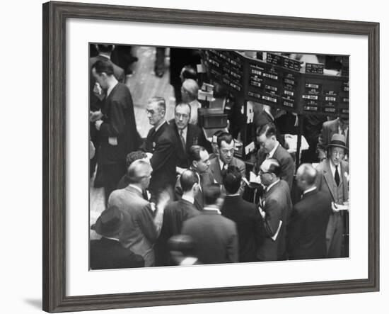 People Crowding the Stock Exchange Building-Charles E^ Steinheimer-Framed Photographic Print