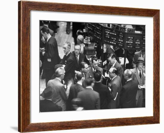 People Crowding the Stock Exchange Building-Charles E^ Steinheimer-Framed Photographic Print