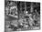 People Eating at a Sidewalk Cafe Next to the Excelsior Hotel-Dmitri Kessel-Mounted Photographic Print