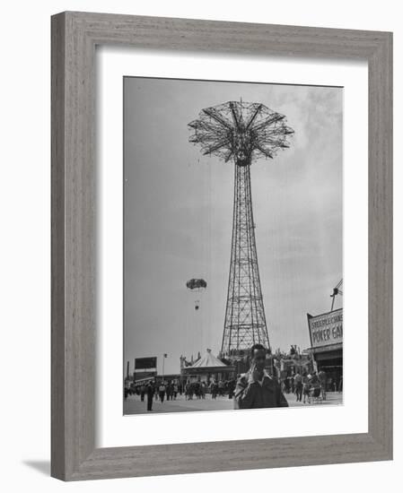 People Enjoying a Ride at Coney Island Amusement Park-Ed Clark-Framed Photographic Print