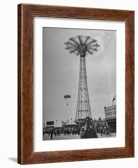 People Enjoying a Ride at Coney Island Amusement Park-Ed Clark-Framed Photographic Print