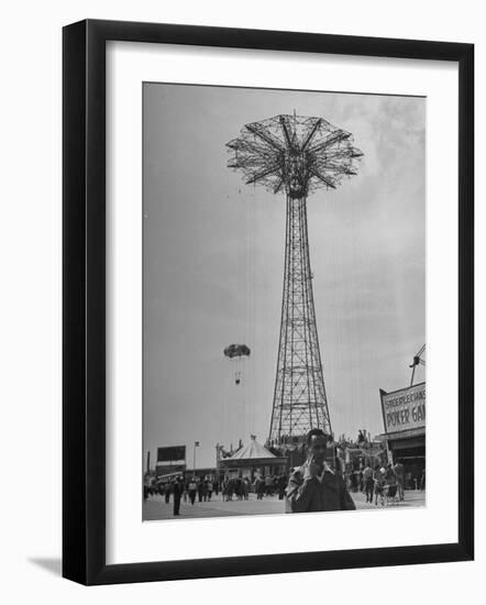 People Enjoying a Ride at Coney Island Amusement Park-Ed Clark-Framed Photographic Print