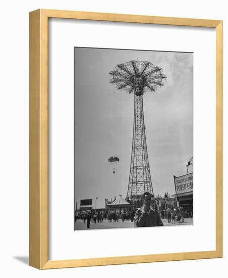 People Enjoying a Ride at Coney Island Amusement Park-Ed Clark-Framed Photographic Print