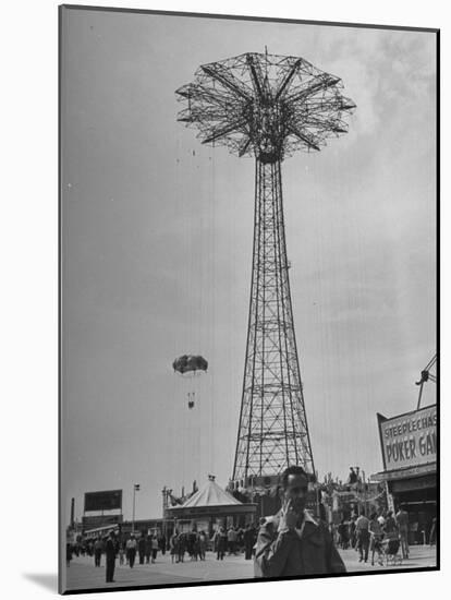People Enjoying a Ride at Coney Island Amusement Park-Ed Clark-Mounted Photographic Print