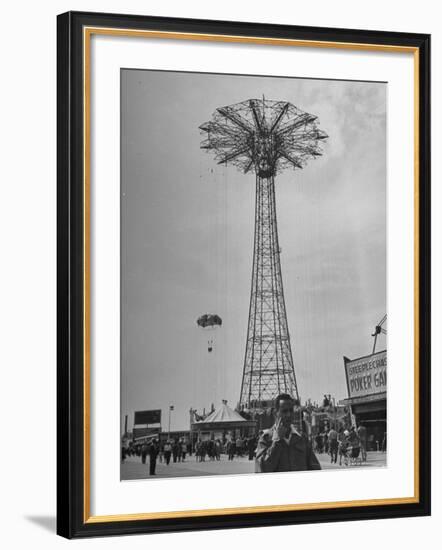 People Enjoying a Ride at Coney Island Amusement Park-Ed Clark-Framed Photographic Print