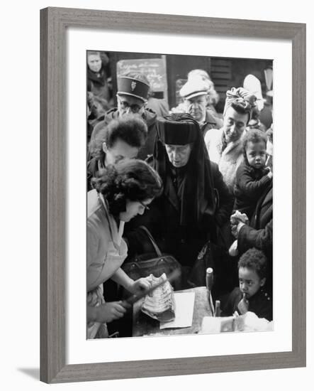 People in a Meat Store Watching Butcher Cut Meat-Yale Joel-Framed Premium Photographic Print