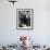 People in a Meat Store Watching Butcher Cut Meat-Yale Joel-Framed Premium Photographic Print displayed on a wall