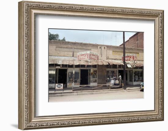 People in Front of Shops and under Metal Awning on Edisto Island, South Carolina, 1956-Walter Sanders-Framed Photographic Print