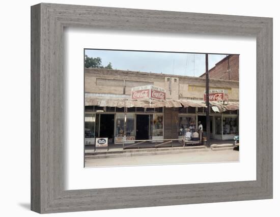 People in Front of Shops and under Metal Awning on Edisto Island, South Carolina, 1956-Walter Sanders-Framed Photographic Print