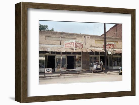 People in Front of Shops and under Metal Awning on Edisto Island, South Carolina, 1956-Walter Sanders-Framed Photographic Print