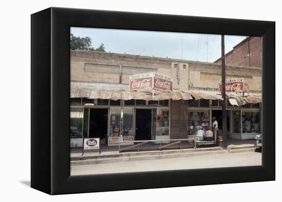 People in Front of Shops and under Metal Awning on Edisto Island, South Carolina, 1956-Walter Sanders-Framed Premier Image Canvas