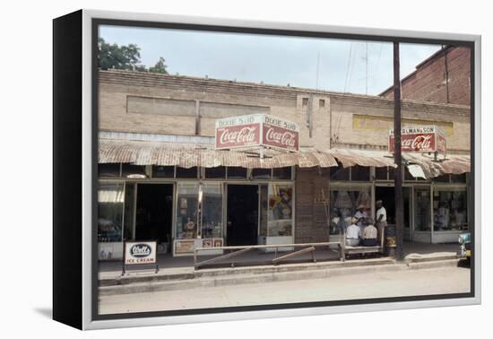 People in Front of Shops and under Metal Awning on Edisto Island, South Carolina, 1956-Walter Sanders-Framed Premier Image Canvas