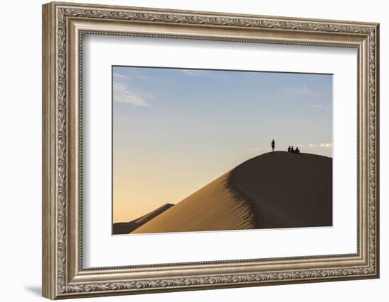 People in silhouette on Khongor sand dunes in Gobi Gurvan Saikhan National Park, Sevrei district, S-Francesco Vaninetti-Framed Photographic Print