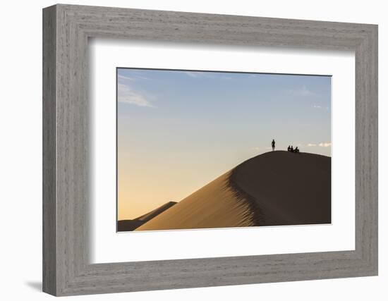 People in silhouette on Khongor sand dunes in Gobi Gurvan Saikhan National Park, Sevrei district, S-Francesco Vaninetti-Framed Photographic Print