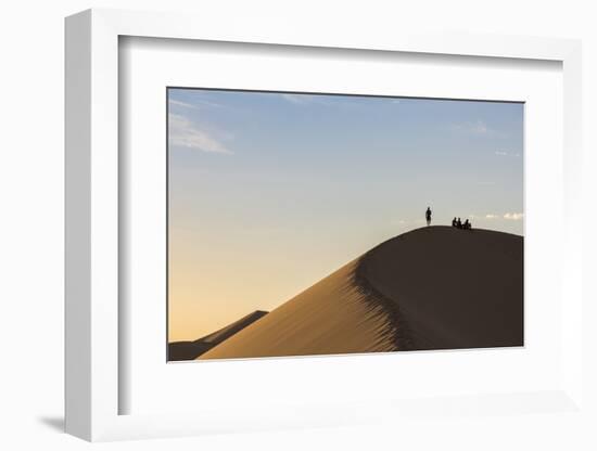 People in silhouette on Khongor sand dunes in Gobi Gurvan Saikhan National Park, Sevrei district, S-Francesco Vaninetti-Framed Photographic Print