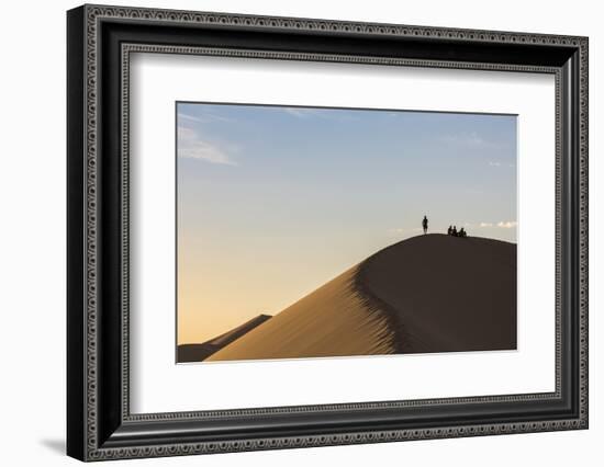 People in silhouette on Khongor sand dunes in Gobi Gurvan Saikhan National Park, Sevrei district, S-Francesco Vaninetti-Framed Photographic Print