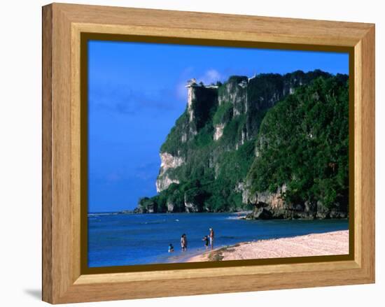 People in Water at Tumon Beach with Amantes (Two Lovers) Point Behind, Tumon, Guam-John Elk III-Framed Premier Image Canvas