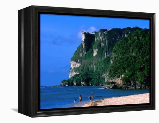 People in Water at Tumon Beach with Amantes (Two Lovers) Point Behind, Tumon, Guam-John Elk III-Framed Premier Image Canvas