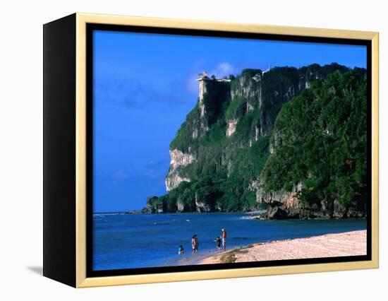 People in Water at Tumon Beach with Amantes (Two Lovers) Point Behind, Tumon, Guam-John Elk III-Framed Premier Image Canvas