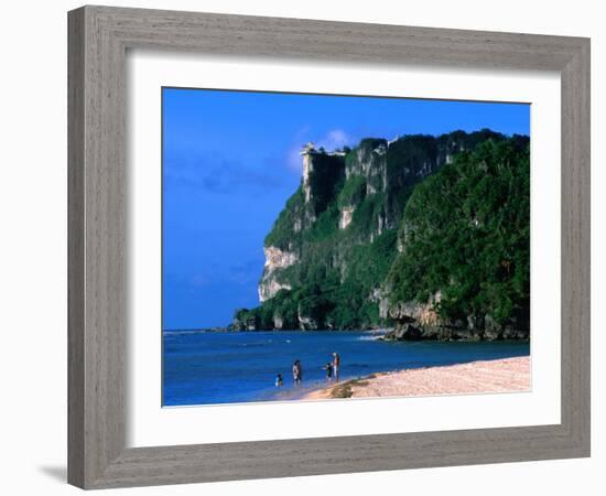 People in Water at Tumon Beach with Amantes (Two Lovers) Point Behind, Tumon, Guam-John Elk III-Framed Photographic Print