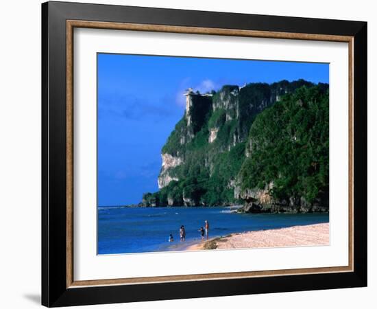 People in Water at Tumon Beach with Amantes (Two Lovers) Point Behind, Tumon, Guam-John Elk III-Framed Photographic Print