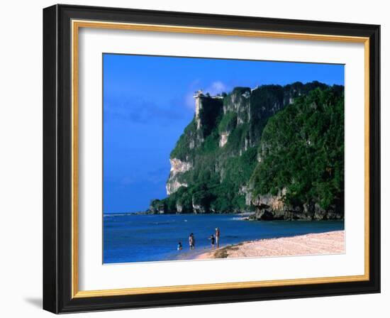 People in Water at Tumon Beach with Amantes (Two Lovers) Point Behind, Tumon, Guam-John Elk III-Framed Photographic Print