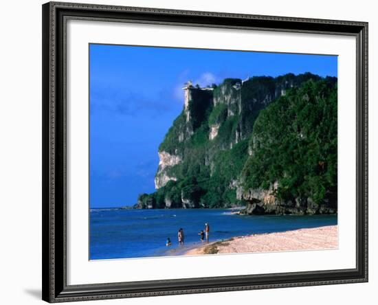 People in Water at Tumon Beach with Amantes (Two Lovers) Point Behind, Tumon, Guam-John Elk III-Framed Photographic Print