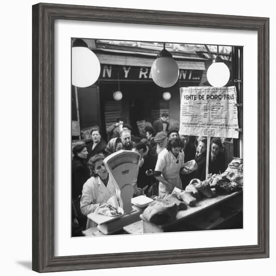 People Looking at Meat in Meat Store While Butchers Measure Out Meats-Yale Joel-Framed Photographic Print