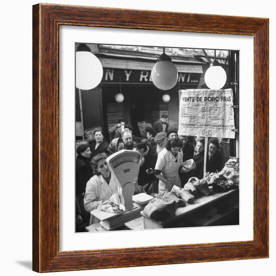 People Looking at Meat in Meat Store While Butchers Measure Out Meats-Yale Joel-Framed Photographic Print