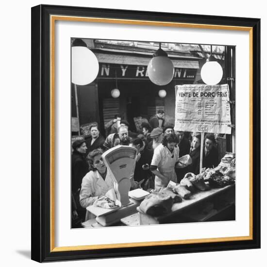 People Looking at Meat in Meat Store While Butchers Measure Out Meats-Yale Joel-Framed Photographic Print