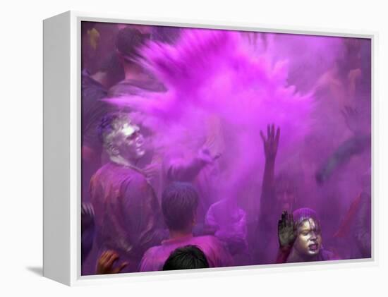 People Painted with Bright Colors Dance During the Festival of Holi on March 7, 2004-Anupam Nath-Framed Premier Image Canvas
