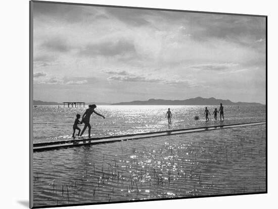People Playing in the Water of the Great Salt Lake-null-Mounted Photographic Print