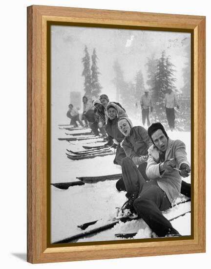 People Playing Tug of War During Snowstorm at Timberline Lodge Ski Club Party-Ralph Morse-Framed Premier Image Canvas