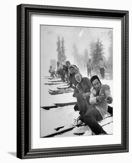 People Playing Tug of War During Snowstorm at Timberline Lodge Ski Club Party-Ralph Morse-Framed Photographic Print