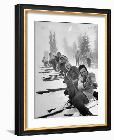 People Playing Tug of War During Snowstorm at Timberline Lodge Ski Club Party-Ralph Morse-Framed Photographic Print