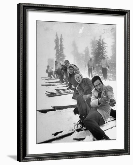 People Playing Tug of War During Snowstorm at Timberline Lodge Ski Club Party-Ralph Morse-Framed Photographic Print