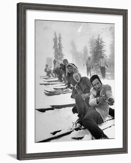 People Playing Tug of War During Snowstorm at Timberline Lodge Ski Club Party-Ralph Morse-Framed Photographic Print